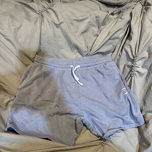 Gym shark shorts (lavender) size large